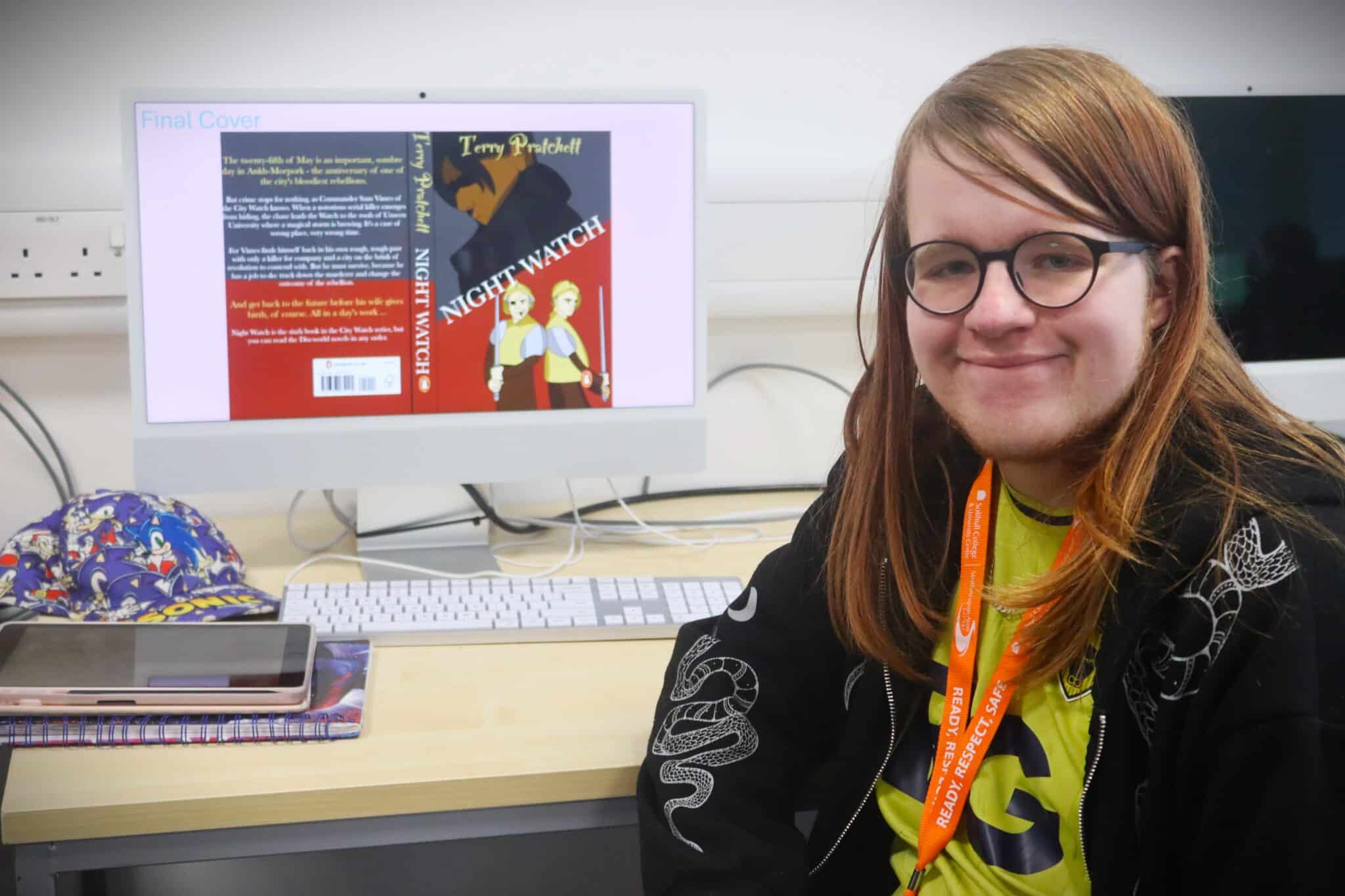 student sat in front of computer