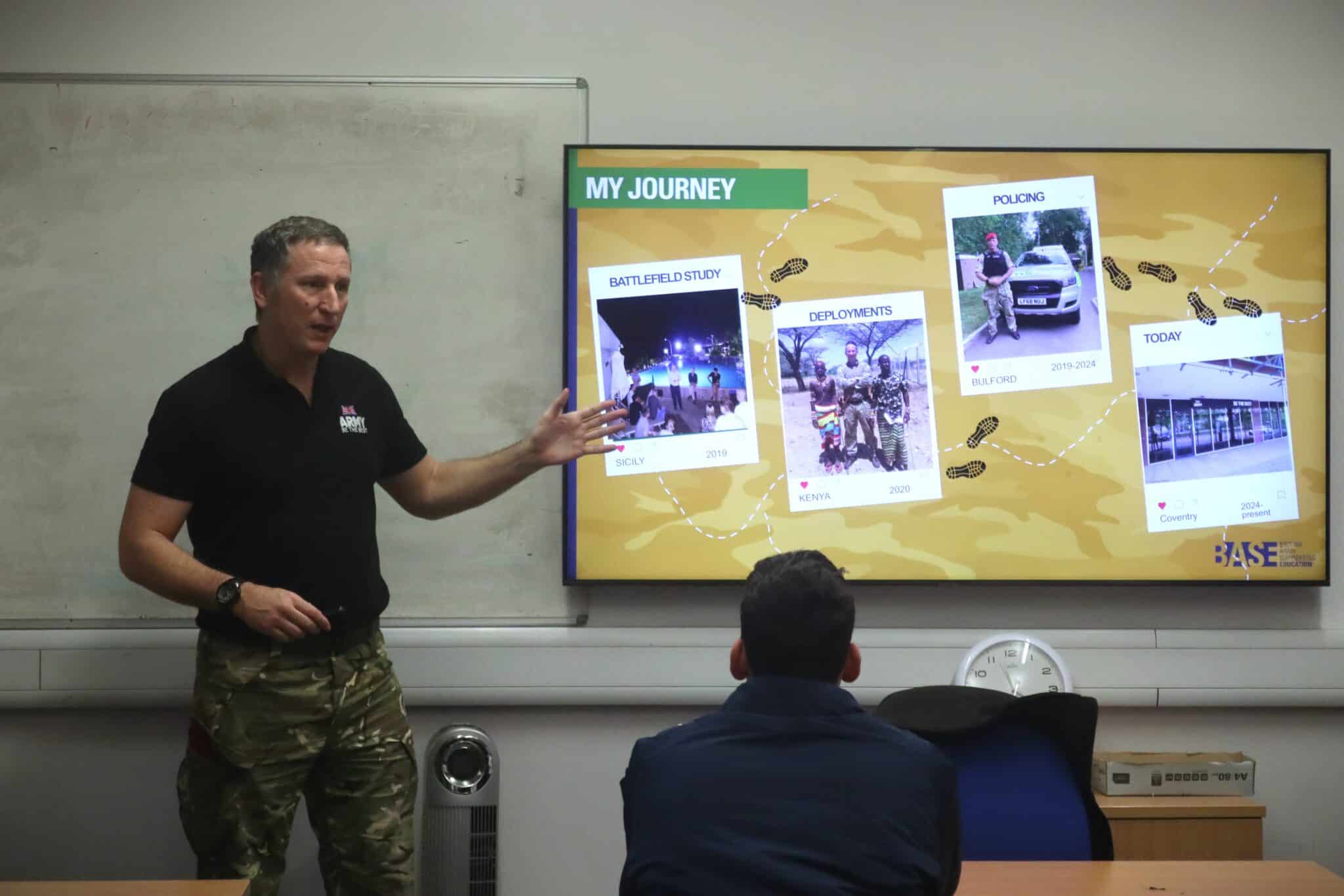 man in front of screen