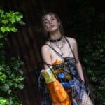 model surrounded by trees