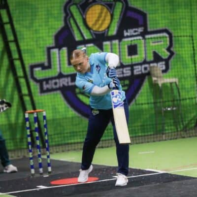 person with cricket bat