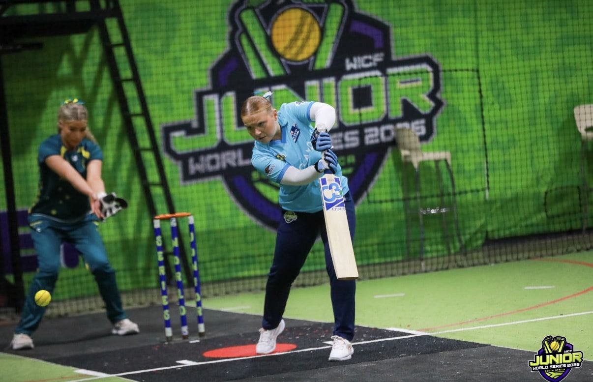 person with cricket bat