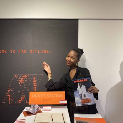 person pointing to display
