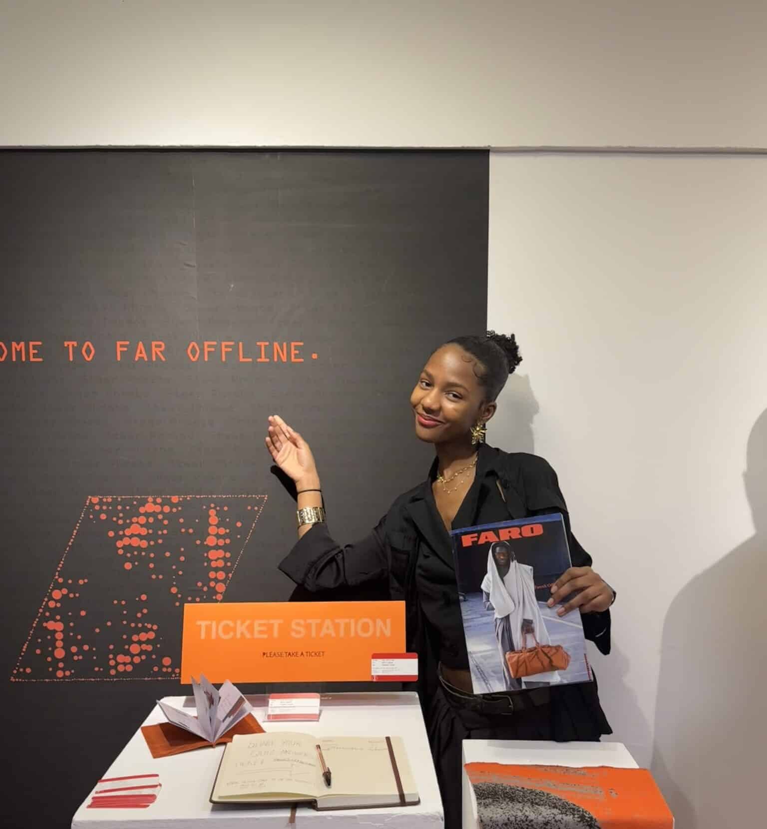 person pointing to display